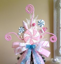 a christmas tree with candy canes and candies