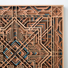 an intricately designed wooden panel on the wall