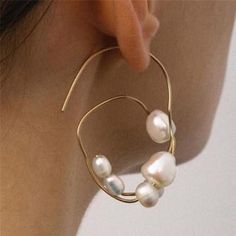 Take a walk into the world of Jewelvana with the Mesmer! This earring will literally lure in any stare. Make your look irresistible. Abstract Earrings, Open Hoop Earrings, Chic Earrings, Round Circle, Circle Earrings, Baroque Pearls, White Pearl, Cultured Pearls, Fashion Earrings