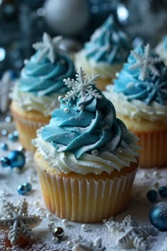 cupcakes with blue frosting and snow flakes