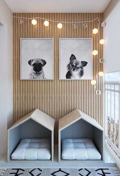 there are two pictures hanging on the wall in this living room, one has a doghouse bed