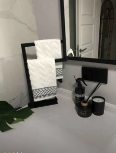 a bathroom sink with a mirror, soap dispenser and brush