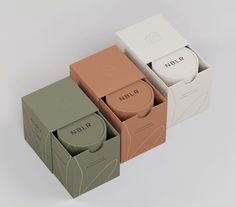 four boxes with different types of items in them