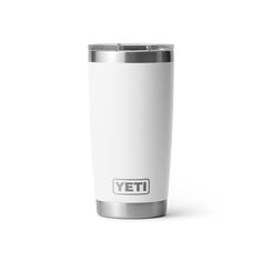 a white yeti cup with the word yeti on it's side is shown