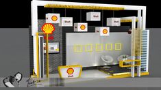 the interior of a shell gas station with yellow accents