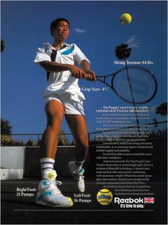 a man swinging a tennis racquet on top of a tennis court