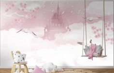 a child's room decorated in pink and white with a castle mural on the wall