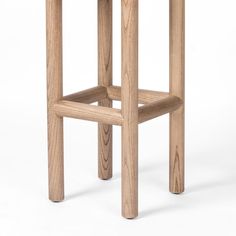 the backless stool is made out of wood