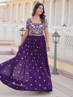 Introducing our captivating purple embroidered georgette function wear gown! This stunning gown is the perfect choice for any special occasion, from festivals to weddings. The gorgeous purple color and sequin embroidery work make this gown a showstopper.
Designed for comfort and style, this gown is fully stitched and available in sizes XS to XXL. The 3.5-meter flair and 56-inch length create a flattering silhouette that will make you feel elegant and confident.
This gown includes intricate sequi Maxi Length Embroidered Dress With Sequins For Wedding, Floor-length Georgette Gown With Intricate Embroidery, Festival Sequin Georgette Dresses, Purple Sequin Floor-length Dress, Purple Full-length Dress For Wedding, Intricate Embroidery Floor-length Georgette Gown, Floor-length Embellished Embroidered Georgette Dress, Bollywood Style Sequined Georgette Dress, Designer Floor-length Maxi Dress With Intricate Embroidery