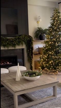 a living room with a christmas tree in the corner