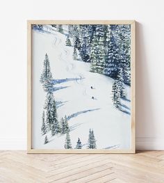 a snow covered mountain with pine trees in the foreground and a skier going down it