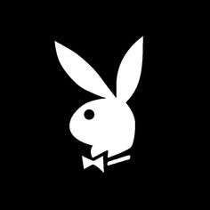 a white rabbit with a bow tie on it's head in the black background