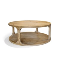 a wooden coffee table with two circular bases