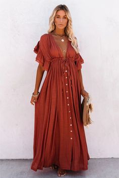 Best Seller The Anika Pocketed Button Down Ruffle Maxi Dress features a lightly textured crepe fabrication in terracotta and fluttery sleeves that meet a plunging v-neckline. Button Maxi Dress, A Line Maxi Dress, Outfit Chic, White Tunic, Beach Maxi Dress, Maxi Robes, Kimono Cardigan, Ruffled Maxi Dress, Cover Up Dress