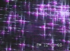 an old television screen with purple lines on it