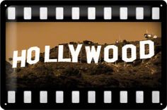 the hollywood sign is shown on top of a hill