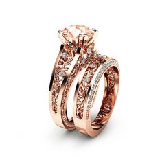 two wedding rings with diamonds on each side and the center stone is set in 18k rose gold