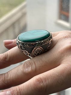 Large Ottoman Ring , Natural Malachite Stone Ring , Green Stone Ring , Ottoman Style , Natural Gemstone Ring , 925k Sterling Silver Ring ★Item Details * Gender : Male / Female * Material : 925K Sterling Silver * Gemstone : Malachite Ring * Total weight :  45 Grams * Stone Size : 30x40 ✔ Ready to Ship in 1-2 Business Days .. ✔ Shipped to the Worldwide 1-5 business days with free shipping... ✔ The product will be sent to you with a handmade wooden box to avoid any damage during shipping... ✔ Visit Traditional Green Sterling Silver Rings, Antique Green Rings With Polished Finish, Antique Green Signet Ring, Traditional Green Hallmarked Rings, Green Oval Engraved Rings, Green Gemstone Engraved Ring Gift, Green Gemstone Engraved Ring For Gift, Handmade Green Signet Ring For Anniversary, Engraved Green Emerald Ring