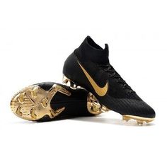 a pair of black and gold nike soccer cleats on a white background,