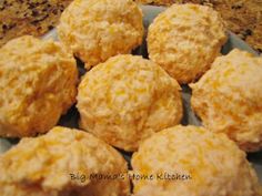 a plate full of biscuits sitting on top of a counter