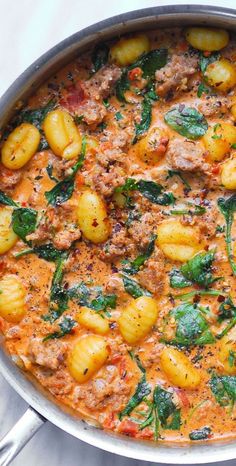 Creamy Italian Sausage Gnocchi with Spinach and Tomato Garlic Sauce in a stainless steel pan Creamy Sausage Gnocchi, Best Gnocchi Recipe, Tomato Garlic Sauce, Tomato Sauce For Pasta, Gnocchi With Spinach, Basic Tomato Sauce, Italian Pasta Recipes Authentic