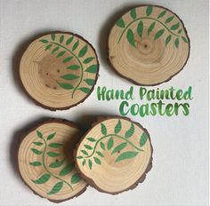 three wooden coasters with painted leaves on them and the words hand painted coasters