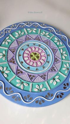 a colorful plate with a decorative design on it