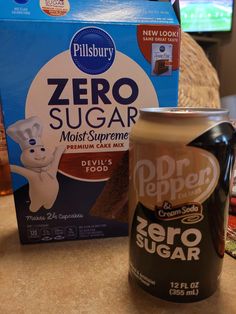 a box of zero sugar next to a can of zero sugar on a counter top