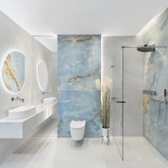 a modern bathroom with marble walls and flooring