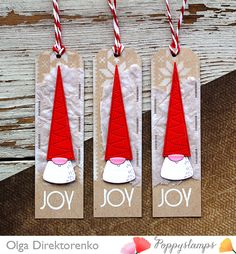 three tags with christmas hats and candy canes on the top one has joy written on it