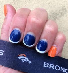 Photo by Kari on June 25, 2021. May be an image of text that says 'BRONCOS' Gemstone Rings, Gemstones, Sports