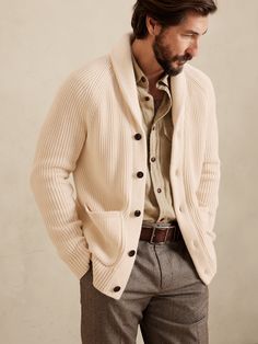 Made with a sumptuously soft, certified-organic cotton for cozy warmth all year long, this beautiful shawl-collar cardigan is intricately knit with ribbed stitches, a perfect pairing for luxurious layering in cooler climes.  ORGANIC: Made with certif Affordable Green Men's Outerwear, Cheap Long Sleeve Casual Sport Coat, Affordable Classic Long Sleeve Sport Coat, Luxury Brown Rugged Sport Coat, Luxury Men's Utility Jacket For Fall, Luxury Men's Pea Coat For Business Casual, Luxury Fall Utility Jacket For Men, Luxury Menswear-inspired Outerwear With Lapel Collar, Luxury Menswear-inspired Sport Coat For Fall