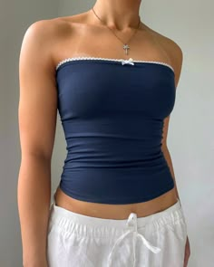 -Handmade tube top using brand new super soft navy blue fabric and elastic -Full-length fit and hemmed -Stretchy and has a double layered front -Has stretchy elastic trim on top -Model is wearing a size S -Free U.S. shipping! ♡ Care & Fabric ♡ *Hand Wash Or Gentle Cycle Machine Wash Cold With Similar Colors/Separately, Do Not Bleach, Hang dry, Cool iron *92% Polyester 8% Spandex Y2k Bandeau Tube Top, Fitted Sleeveless Lace Trim Tube Top, Fitted Lace Trim Sleeveless Tube Top, Fitted Sleeveless Tube Top With Lace Trim, Y2k Stretch Tube Top, Strapless Fitted Y2k Tube Top, Strapless Fitted Tube Top Y2k Style, Y2k Fitted Strapless Tube Top, Y2k Strapless Fitted Tube Top