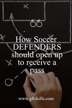 someone writing on a blackboard with the words how soccer defenders should open up to receive a pass
