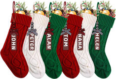 five christmas stockings with name tags on them