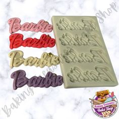 four cookie cutters with the words bride and groom in different font styles on them