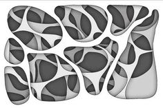 an image of some black and white shapes in the shape of rocks or stones on a white background