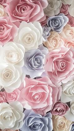 many different colored roses are arranged in the shape of a wall paper flower bouquets