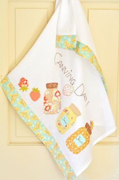 a tea towel hanging on a door with the words grandma's day printed on it