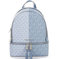 Nwt Michael Kors Rhea Medium Signature Logo Colorblock Semi Lux Backpack - Soft Sky Multi Backpack Is Brand New With Tags Attached And Comes From A Smoke Free And A Pet Free Home. From Michael Kors, The Rhea Medium Signature Logo Colorblock Semi Lux Backpack Features: * Pvc/Polyester/Pu * Zip Closure * Interior: 1 Back Zip Pocket, 1 Back Slip Pocket, 4 Front Slip Pockets * Exterior: 2 Front Zip Compartments * Approx. 9.5" W X 12.5" H X 5" D Bag; 1" Handle Drop; 25" - 30" Adjustable Detachable St Blue Leather Bags With Logo, Rectangular Blue Backpack, Blue Travel Bag With Logo, Blue Travel Bags With Logo, Blue Logo Travel Bags, Light Blue Travel Backpack, Luxury Stuff, Velvet Backpack, Small Backpack Purse