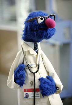 a blue stuffed animal with glasses on it's face and the words i'm sorry mr count but your days are numbered