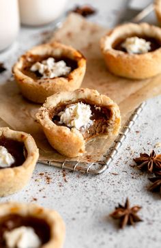 Mini pumpkin pies on parchment paper. Delicious Thanksgiving