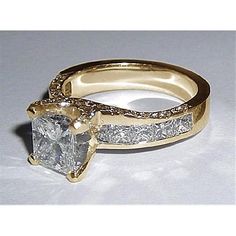 an engagement ring set with a princess cut diamond