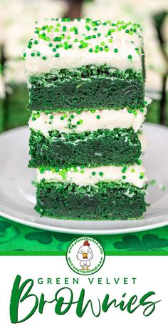 green velvet brownies stacked on top of each other with white frosting and sprinkles