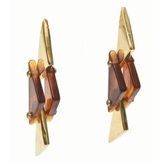 Triangles meet tortoise resin in these great pair of vintage pierced dangle earrings.They have sculptural form to them as alternating brass plated and tortoise lucite triangles are inverted. They are modern and make a great statement. Their length is 3.5" H/L and 0.5" W. They are from the 70's. Victorian Drop Earrings, Gemstone Necklaces, Diamond Dangle Earrings, Plastic Jewelry, Designer Fashion Jewelry, Amber Jewelry, Earring Sale, Art Accessories, Vintage Diamond