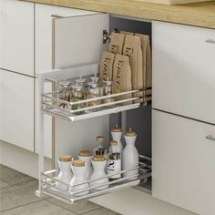 an open cabinet in a kitchen filled with spices