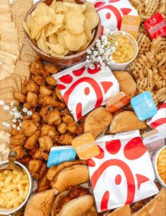 an assortment of snacks are laid out on a table