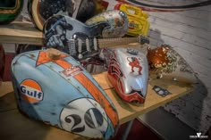 several different types of motorcycle helmets on display