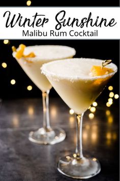 two martinis with orange peel garnish on the rim and text winter sunshine malbu rum cocktail