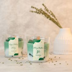 two candles sitting next to each other on a table